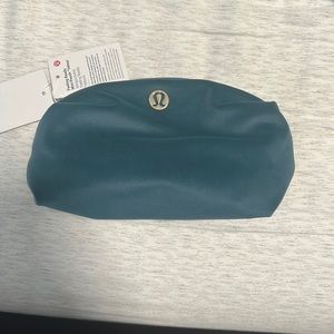 Lulu lemon cosmetic case in velour green. New with tags
